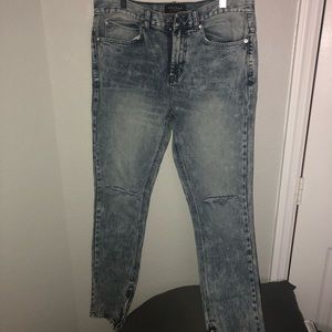 Washed zipper jeans